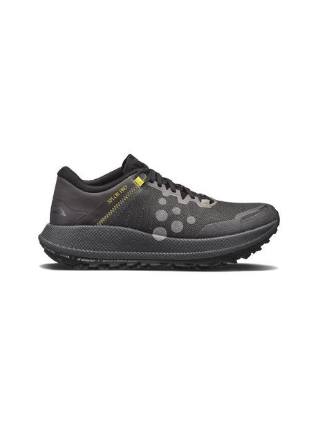 Black trail running shoe on a white background