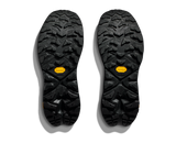 Black shoe soles with tread pattern and orange Vibram logo on a white background