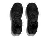 Pair of black high-top sneakers on a white background
