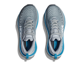 Gray and blue running shoes on a white background