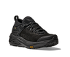 Black hiking shoe with a textured sole on a white background