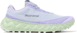 Light purple running shoe with green sole on a white background