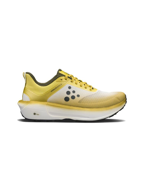 Yellow running shoe with a white sole on a white background