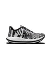 Black and white sneaker with abstract pattern on a white background