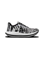 Black and white sneaker with abstract pattern on a white background