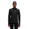 A woman wearing a black weather jacket with reflective elements on the sleeves and chest.