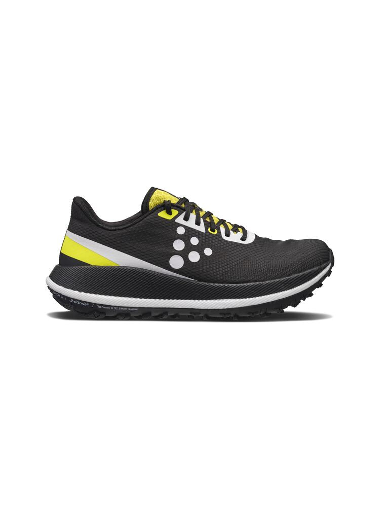 Black running shoe with yellow accents on a white background