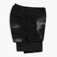 A pair of black women's active shorts with a subtle pattern and reflective details.